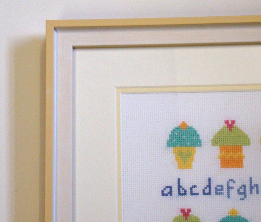 Cross stitch framed for baby