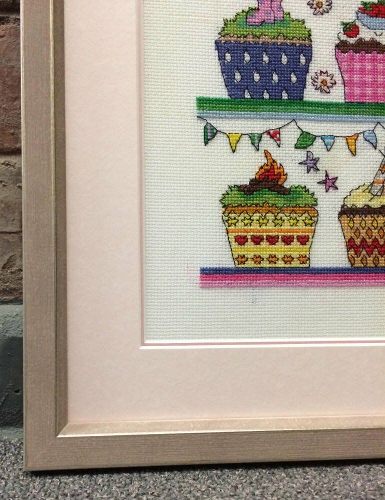 Pink frame hand sewn artwork double mounts - Cupcakes cross stitch framed